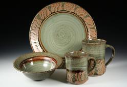 dinner set, dark green with "tiger" stripes